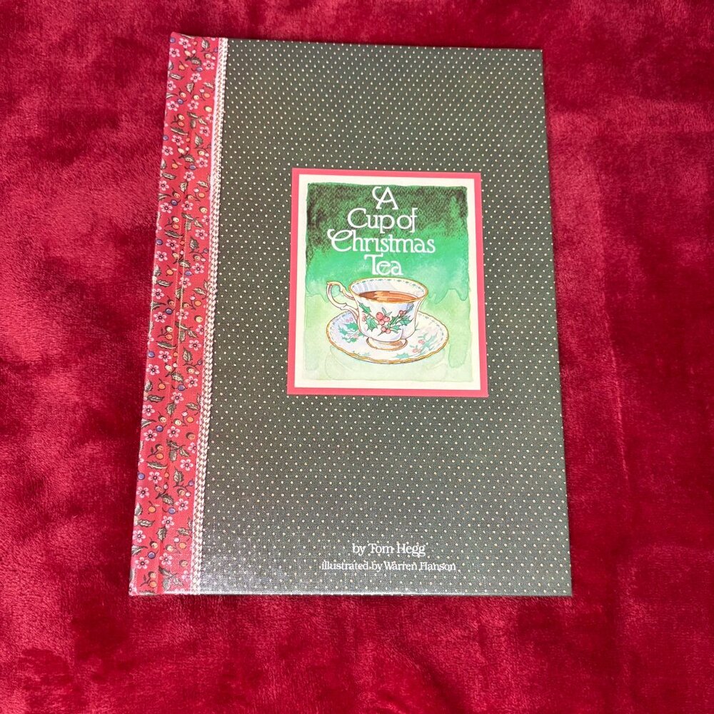 Like new, "A cup of Christmas Tea" book by Tom Hegg, vintage 1982